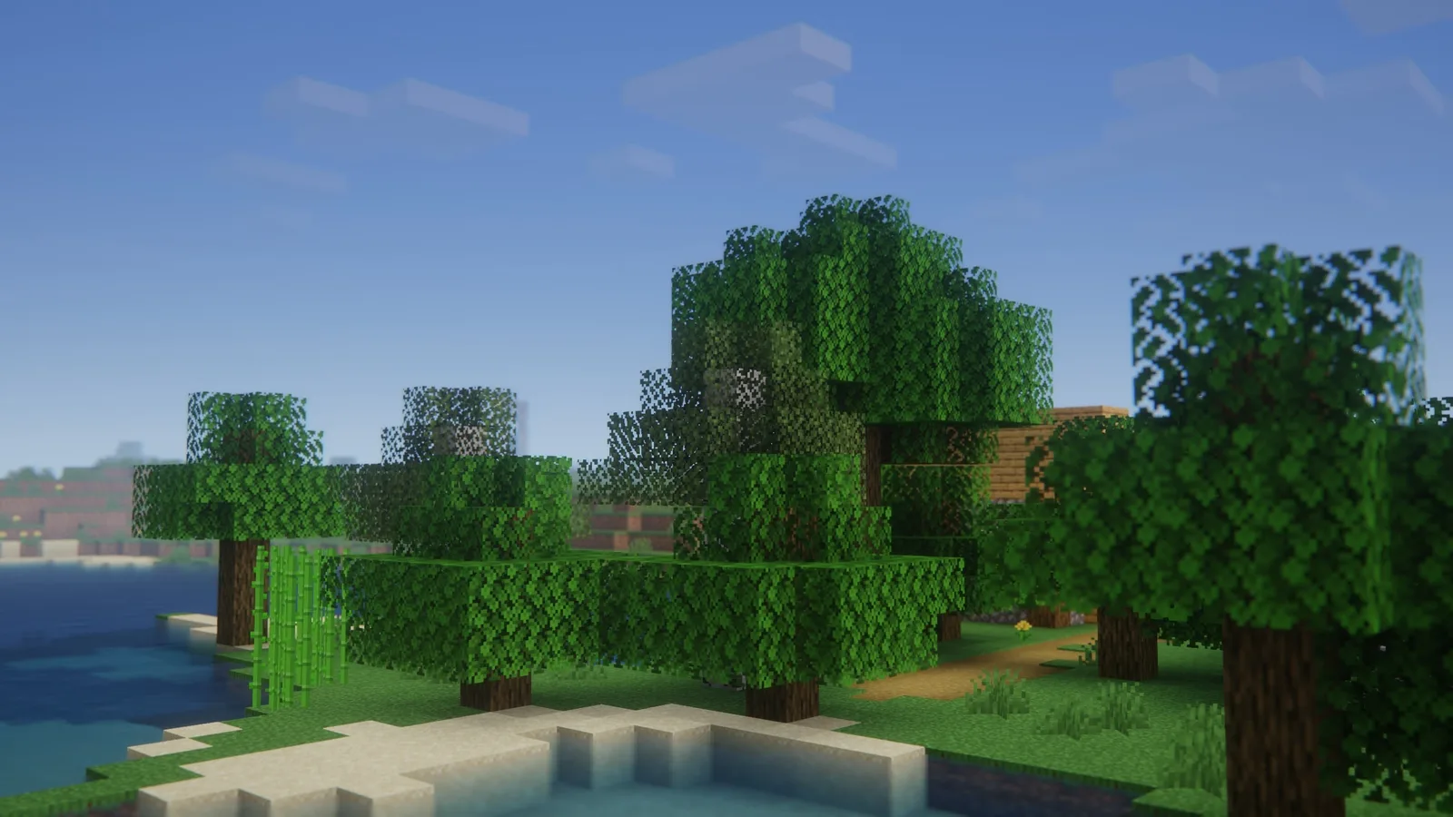 Potato Shaders: a sunny forest by the water with simple shadows and slightly richer colors
