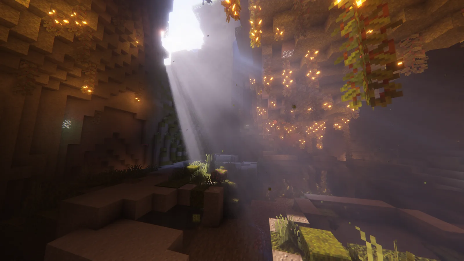 Complementary shaders lighting: sunlight shafts falling into a lush cave with glow berries